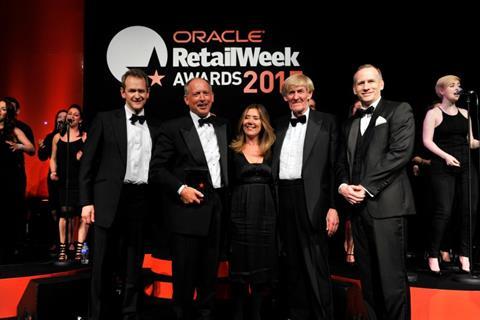 Sir Ian Cheshire collects his award for Outstanding Contribution to Retail